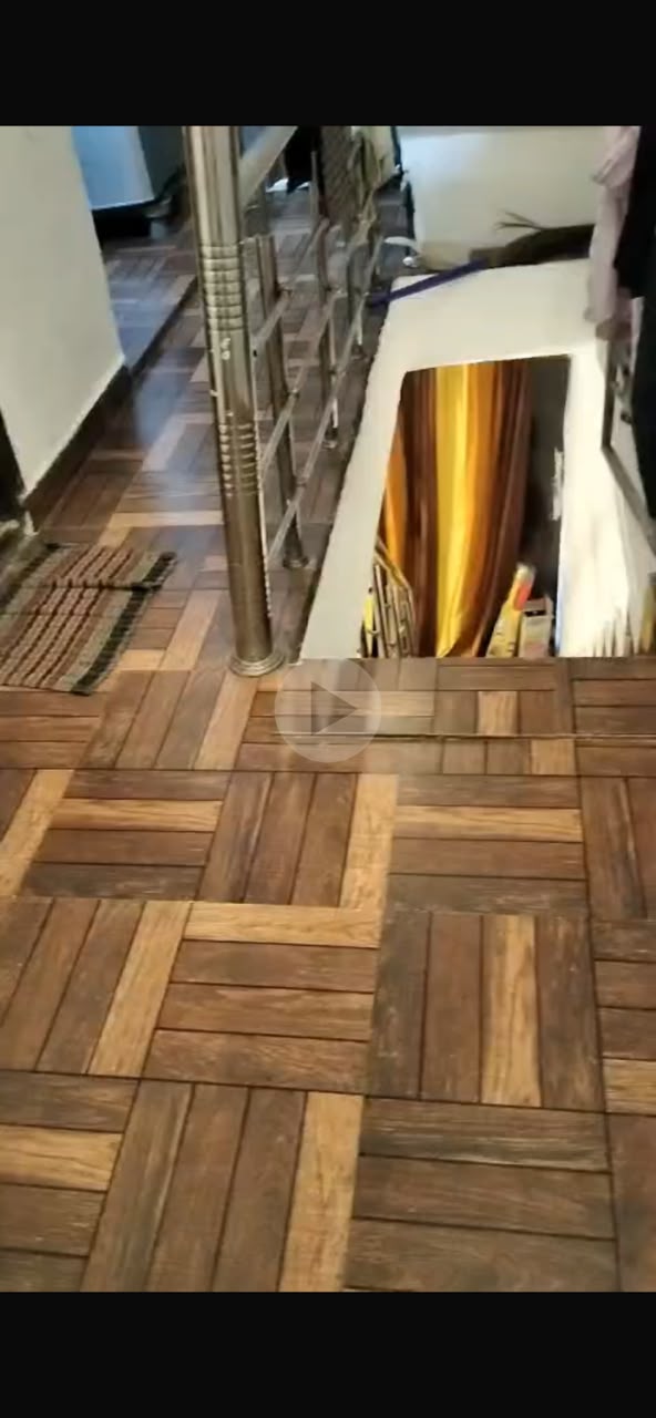 Wooden-pattern staircase with stainless steel railing