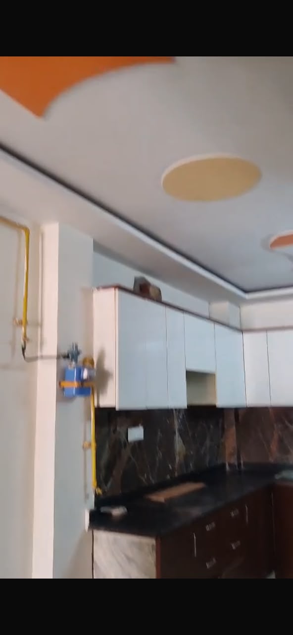 Modern modular kitchen with marble backsplash